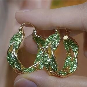 Twisted hoop earrings, green gemstone, gold plated